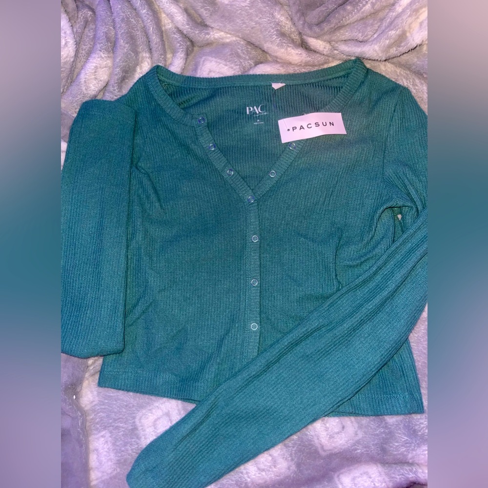 Long sleeve cropped top , button/ snap down